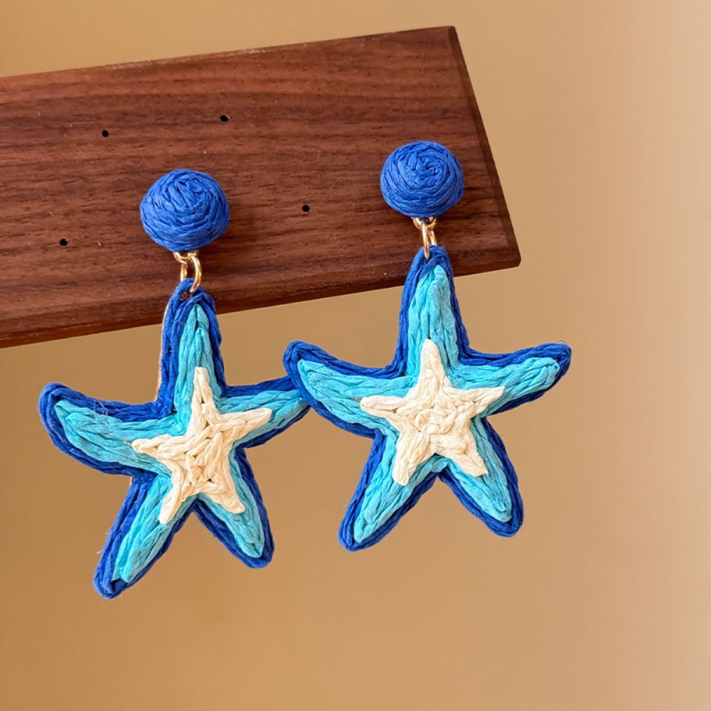 Ethnic Chic Fashion - Charms Boheemse zeester oorknopjes Stroweven Chique